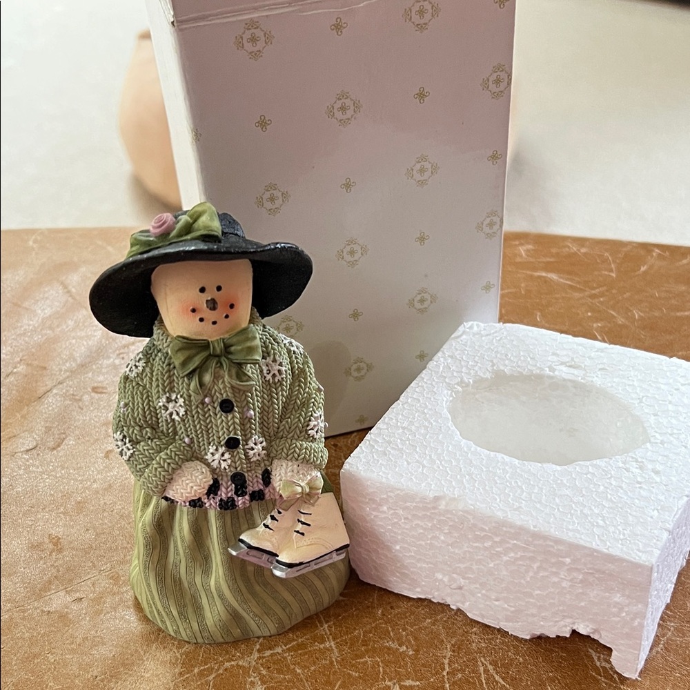 Charming Green and Black Figurine